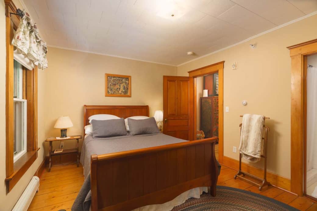 Ezra’s Room with earth tones and a queen sleigh bed for restful nights. Ezra’s Room with earth tones and a queen sleigh bed for restful nights.