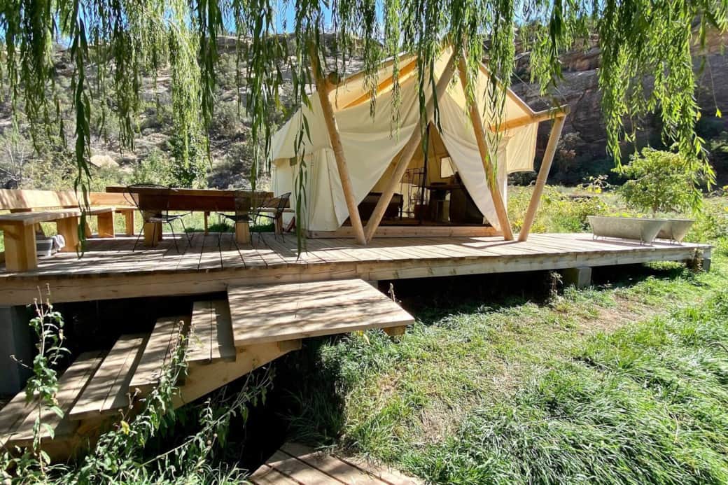 East tent's deck, outdoor seating and soaking tubs