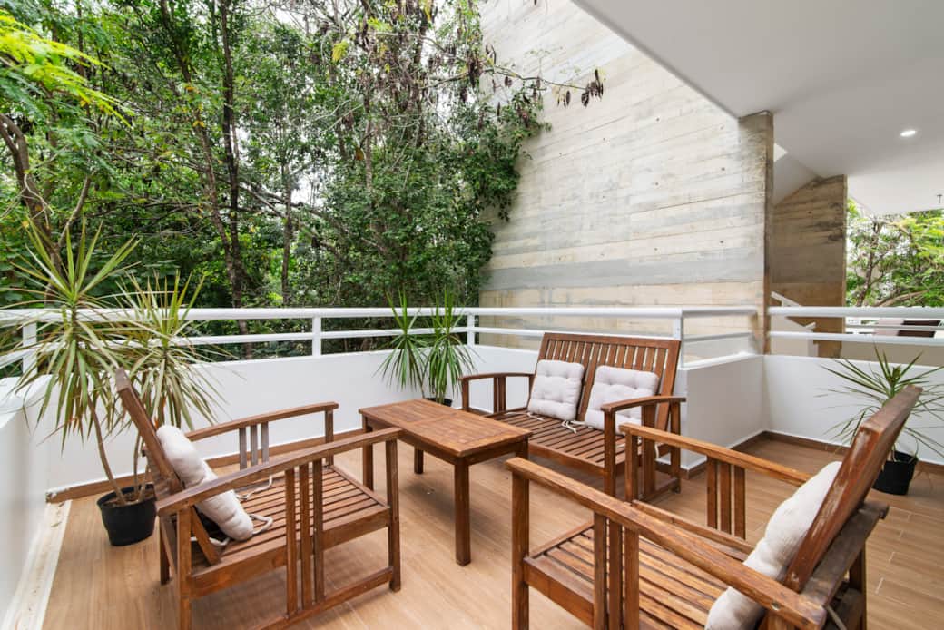 Balcony seating for four, perfect for conversations and memorable moments.