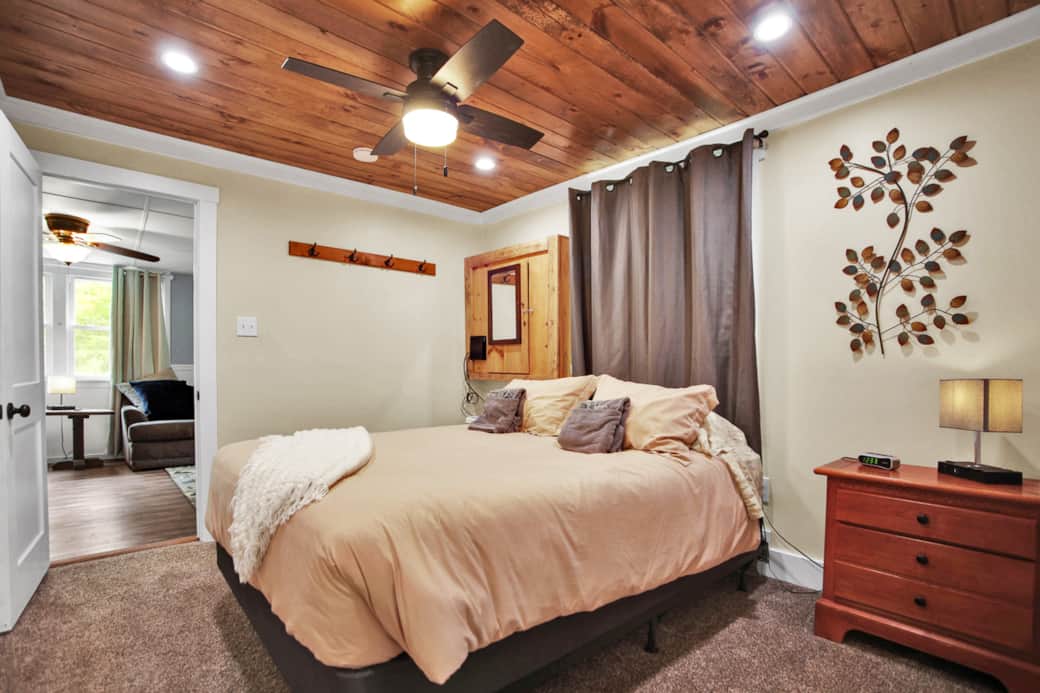 Bedroom 1 - Queen bed, attached bathroom with walk in shower, hairdryer available