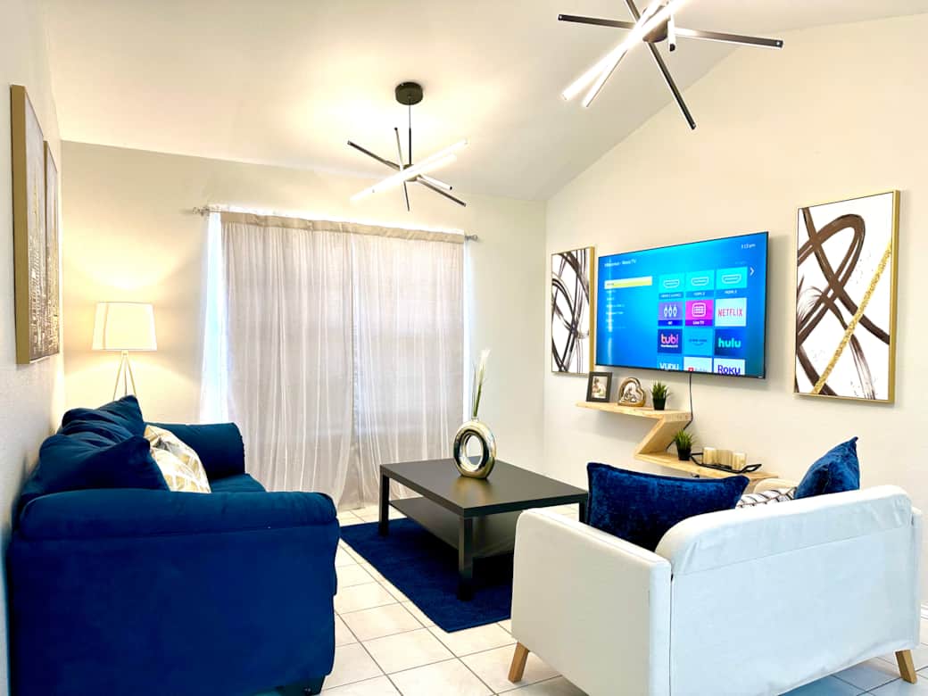 spacious living room with a 65in. TV to enjoy for favorite show or moview