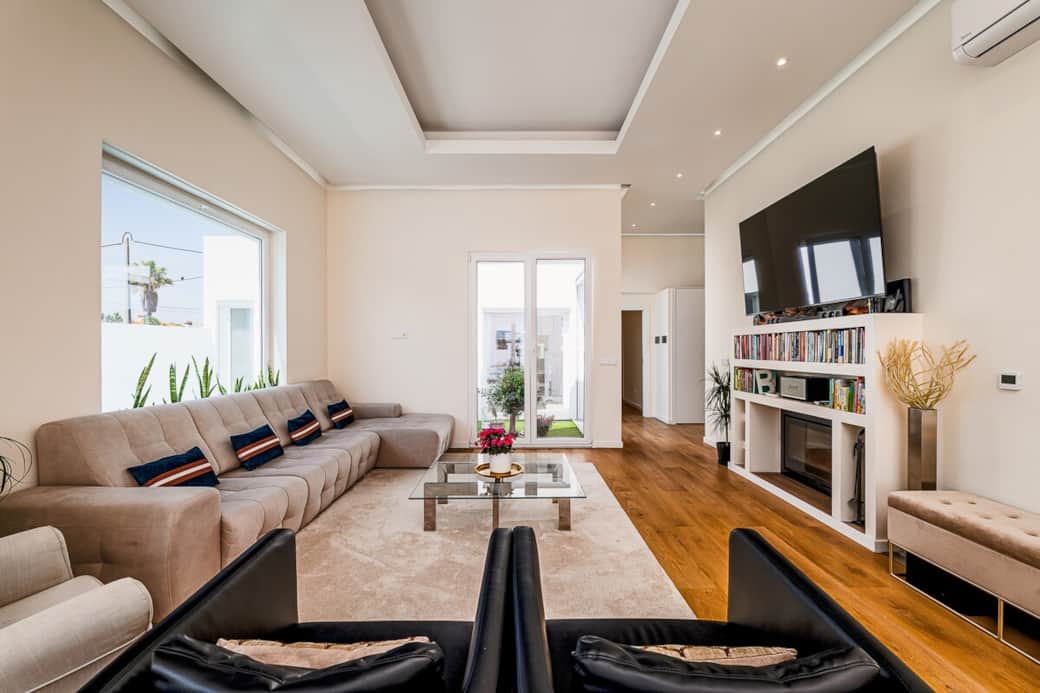 Sitting Room: Large TV, library of spiritual and self-growth books, and games for the family.