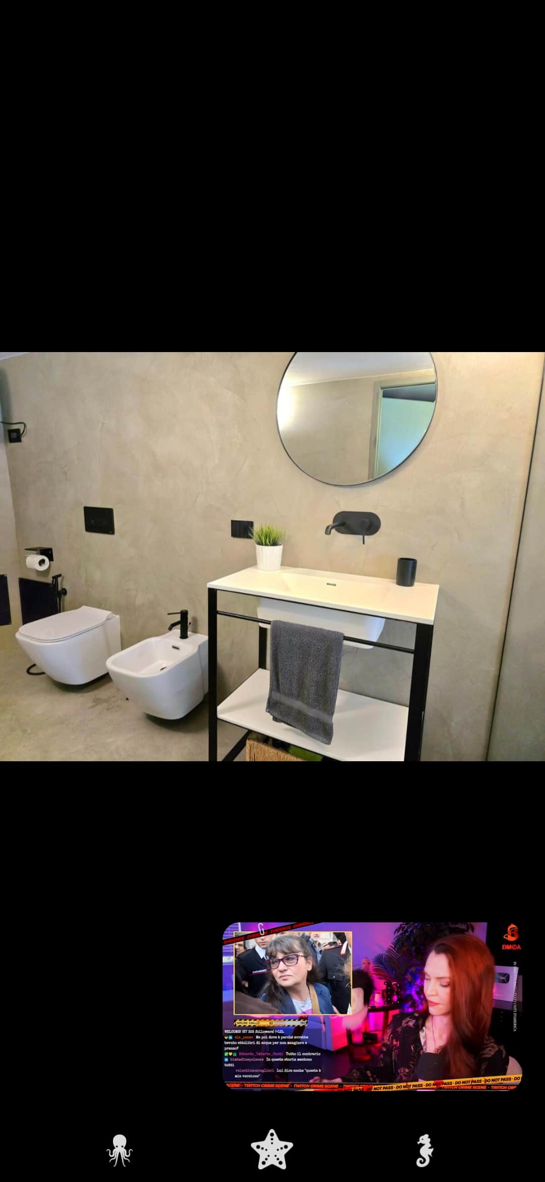 Modern bathroom with basin, toilet and bidet