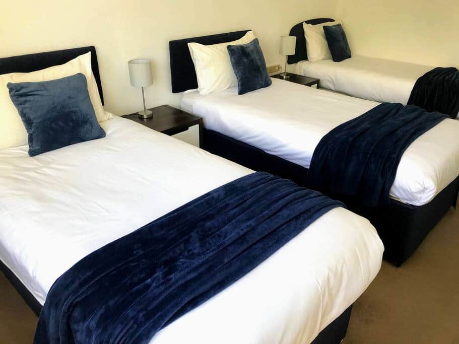 Bedroom 1 set up as a triple room