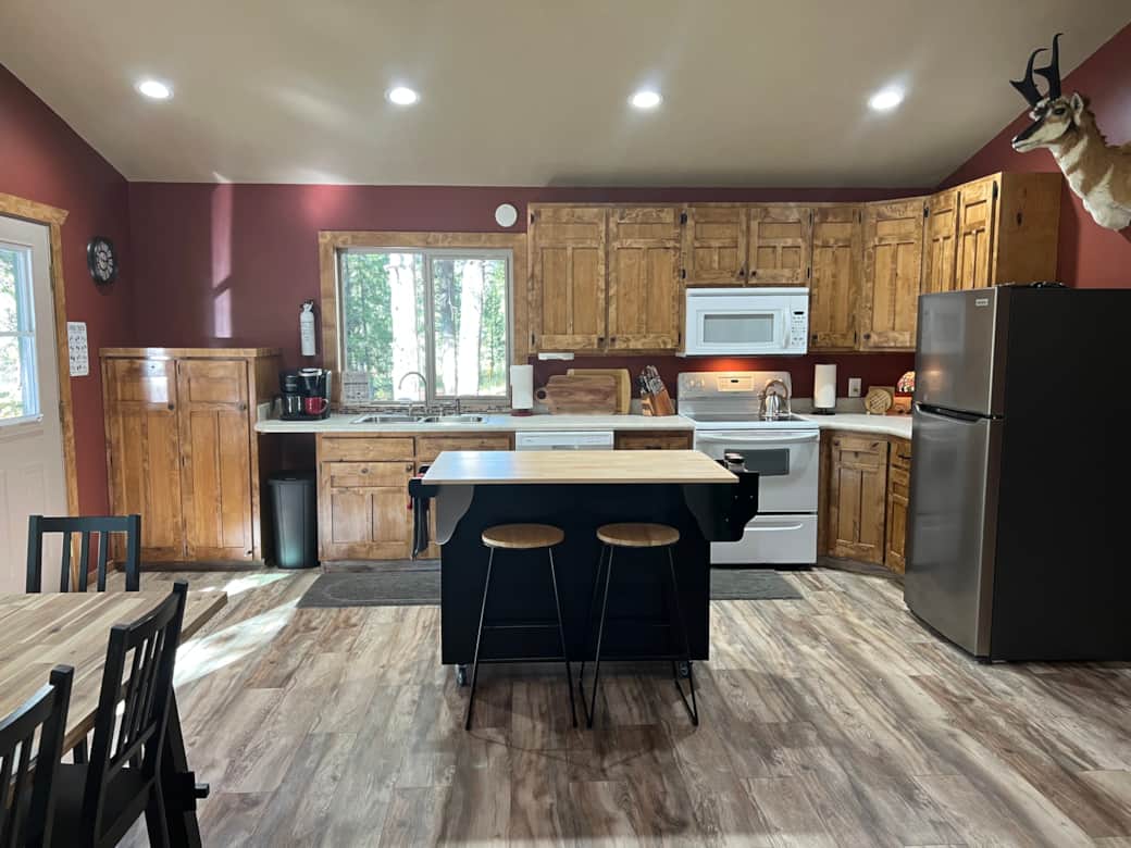 Kitchen Island works great for extra prep and serving space. Even adds 2 extra seats. Kitchen Island works great for extra prep and serving space. Even adds 2 extra seats.