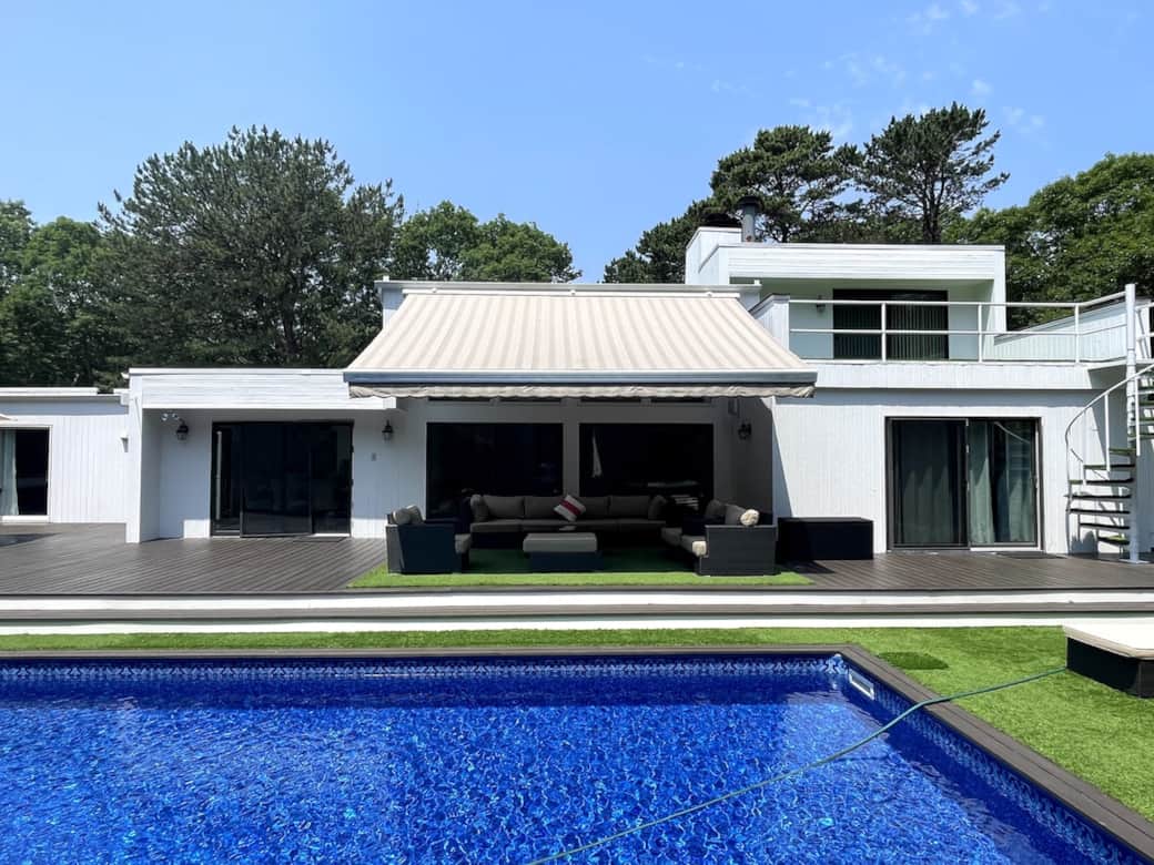 Retractable awning and large sitting area next to the pool makes for great summer days sitting or swimming -you pick ! Retractable awning and large sitting area next to the pool makes for great summer days sitting or swimming -you pick !