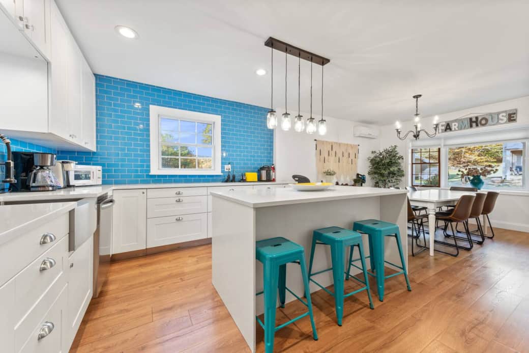 fully equipped kitchen, open to dining area. This is a popular gathering area for board games.