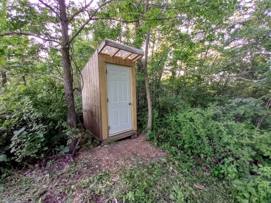 Outhouse with composting toilet