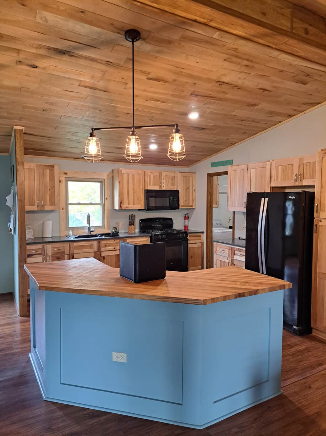 Full kitchen - sink, stove, oven, microwave, refrigerator, & freezer 