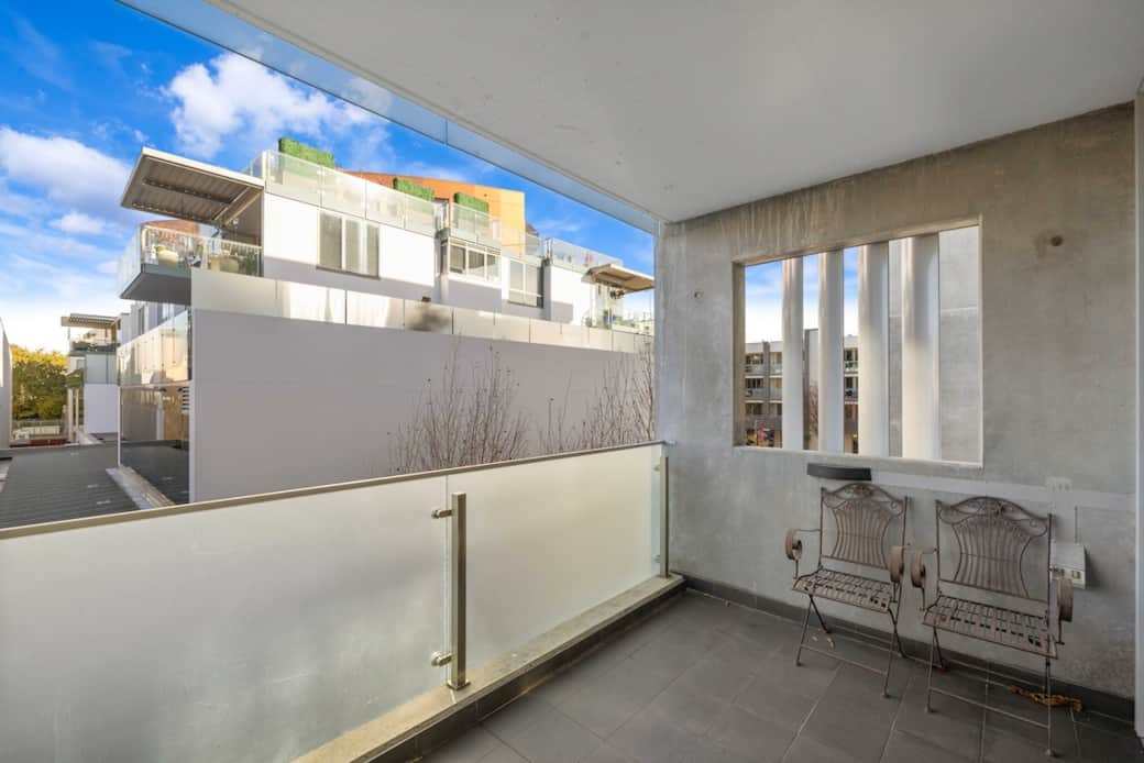 Relax on your private balcony with stylish outdoor seating and open views of the modern neighborhood. Whether you’re sipping morning coffee or enjoying a sunset breeze, this space offers the perfect blend of comfort, privacy, and fresh air.