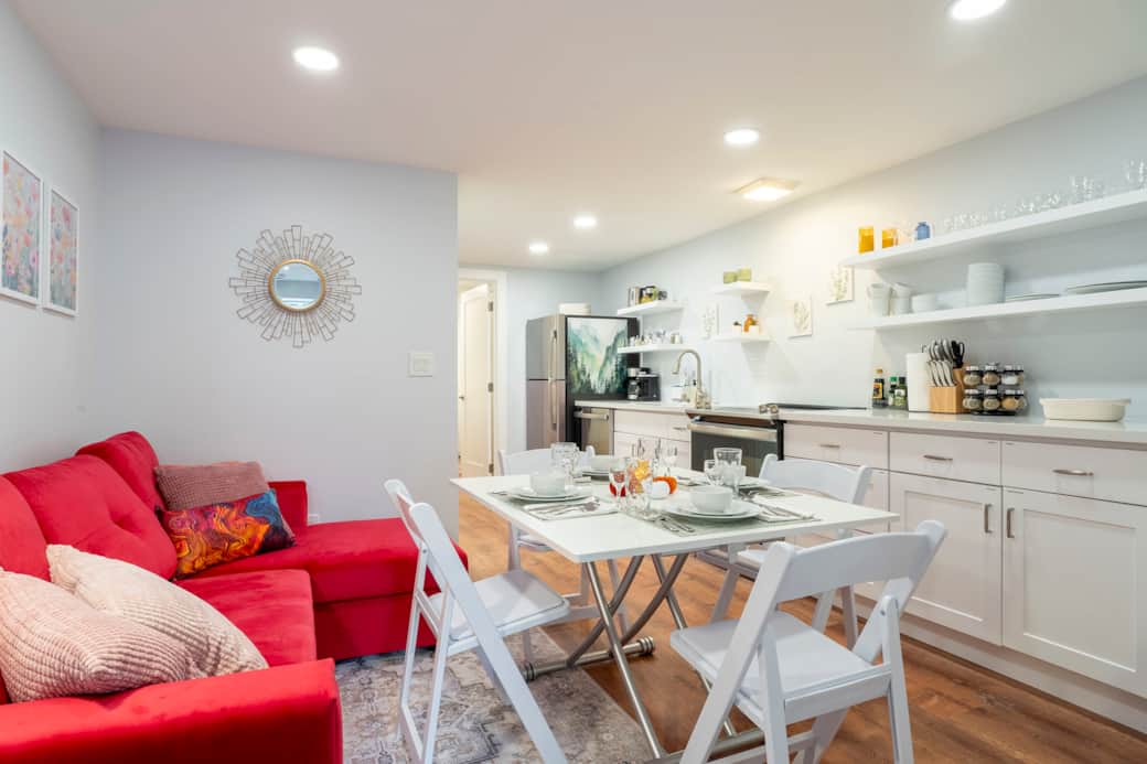 Four chairs are available as well as placemats, napkins, dishes, silverware