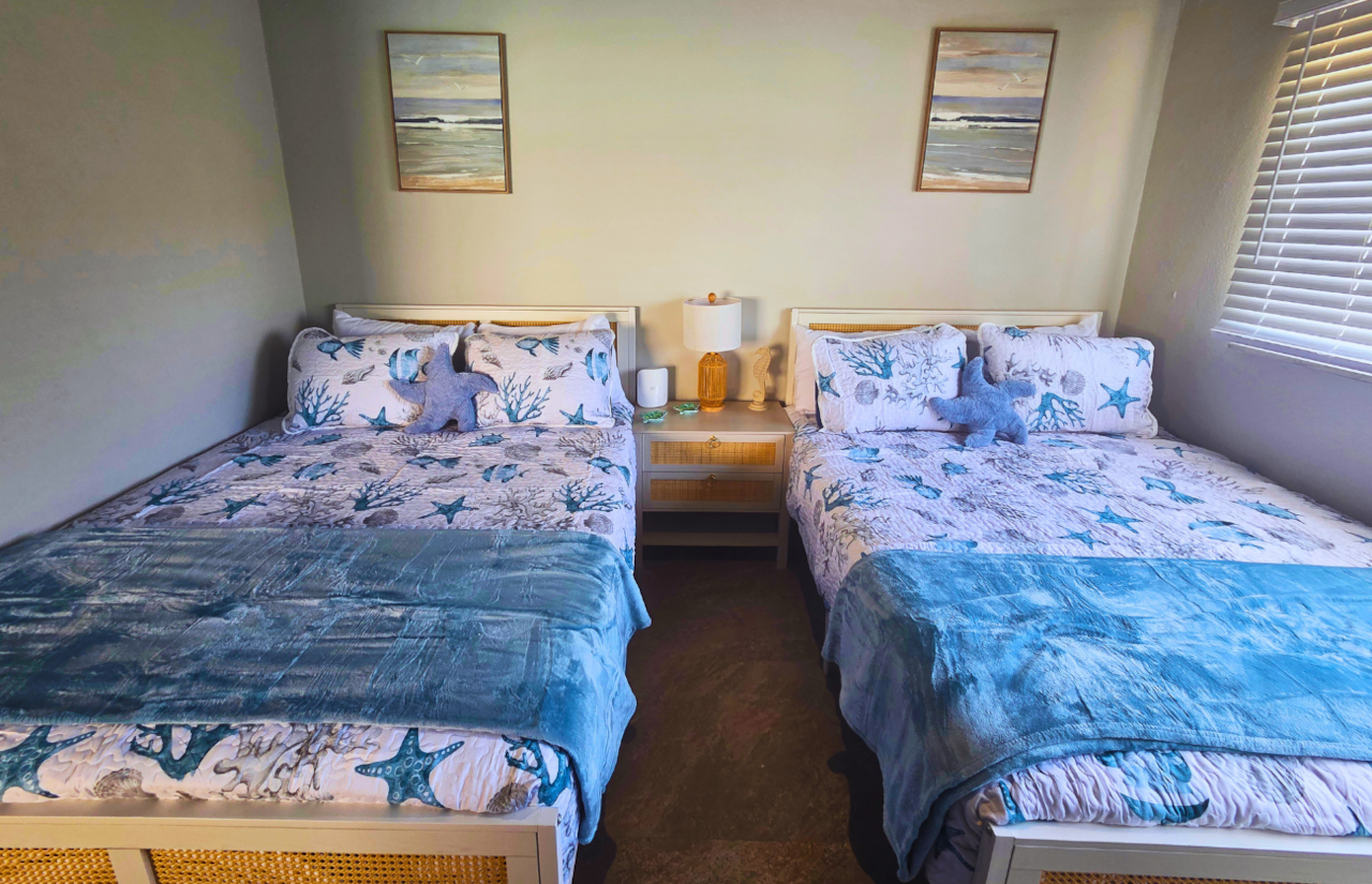 Two Queen beds with premium linens for the perfect night's sleep. Treasure Island, FL
