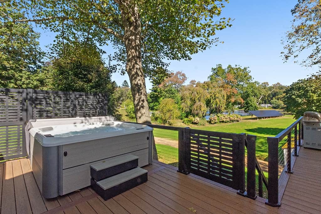 Enjoy a private outdoor hot tub perfect for unwinding after a long day.