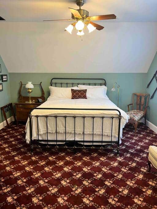 This is the Hayloft Suite. It has a California king bed and a full-size bed.