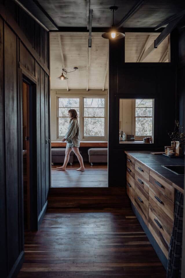 View from the well-equipped kitchen into the living room.