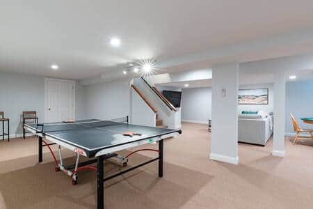 Game room with ping pong table