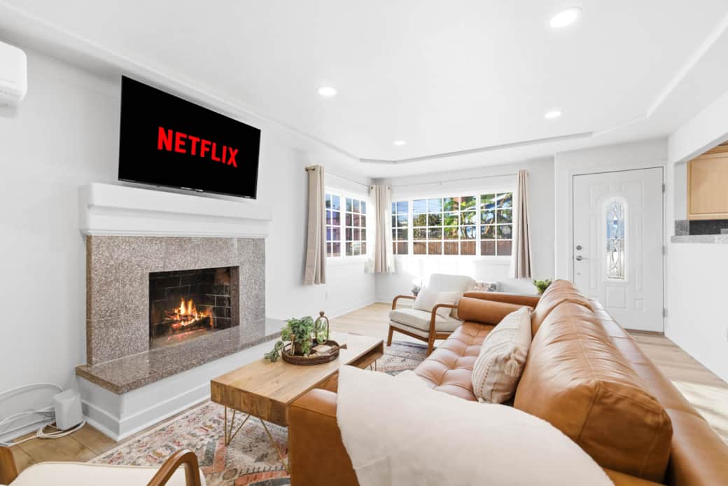 Living Area W/ Fireplace & Smart TV
