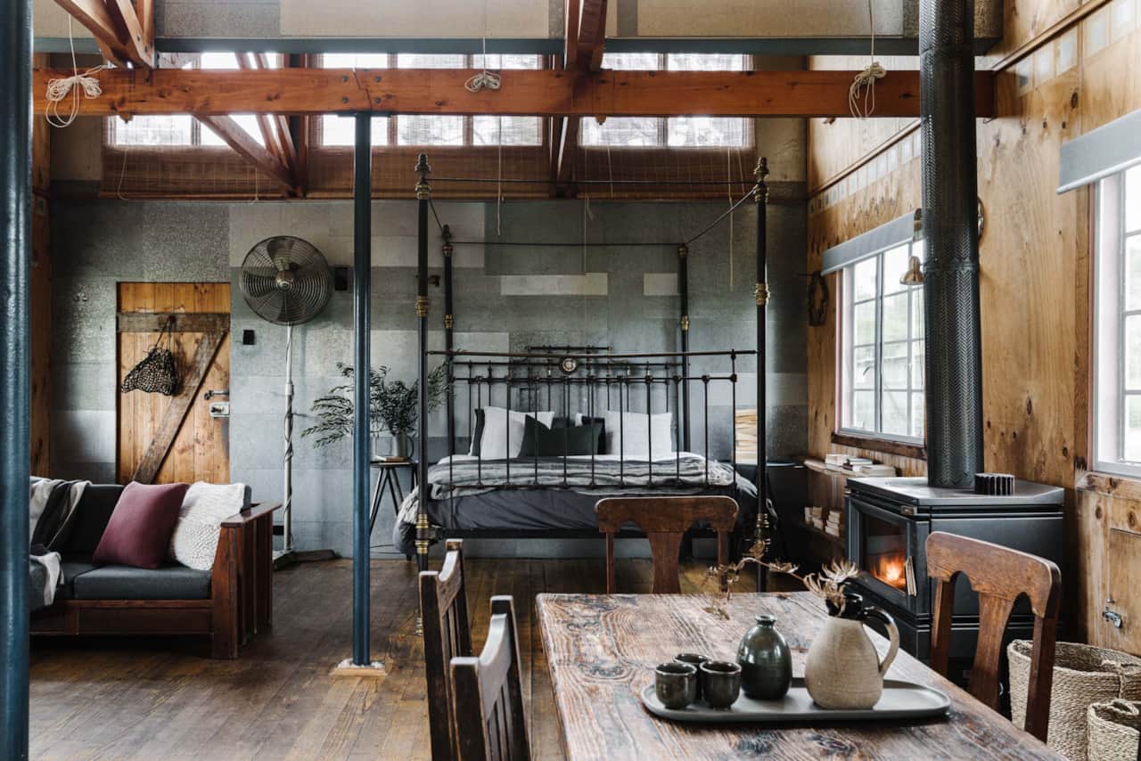 Liptrap Loft open plan cabin with king bed and wood fire, Walkerville VIC.
