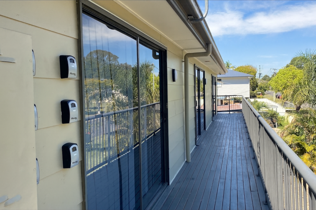 Balcony: Entrance balcony overlooking trees and greenery