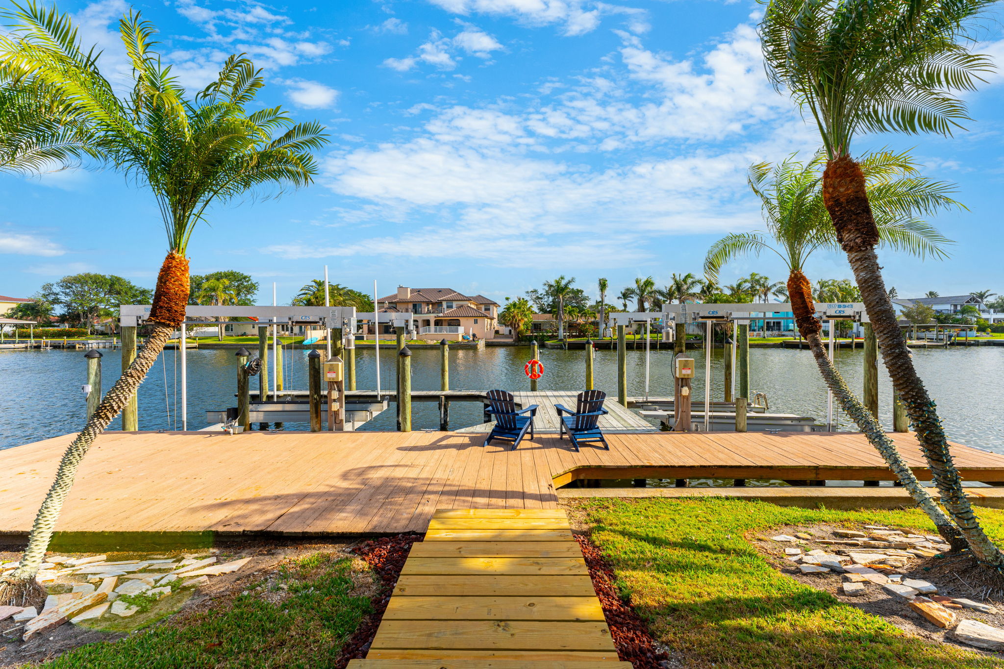 Step out onto your private waterfront dock. Ideal for relaxing by the water or enjoying a sunset.