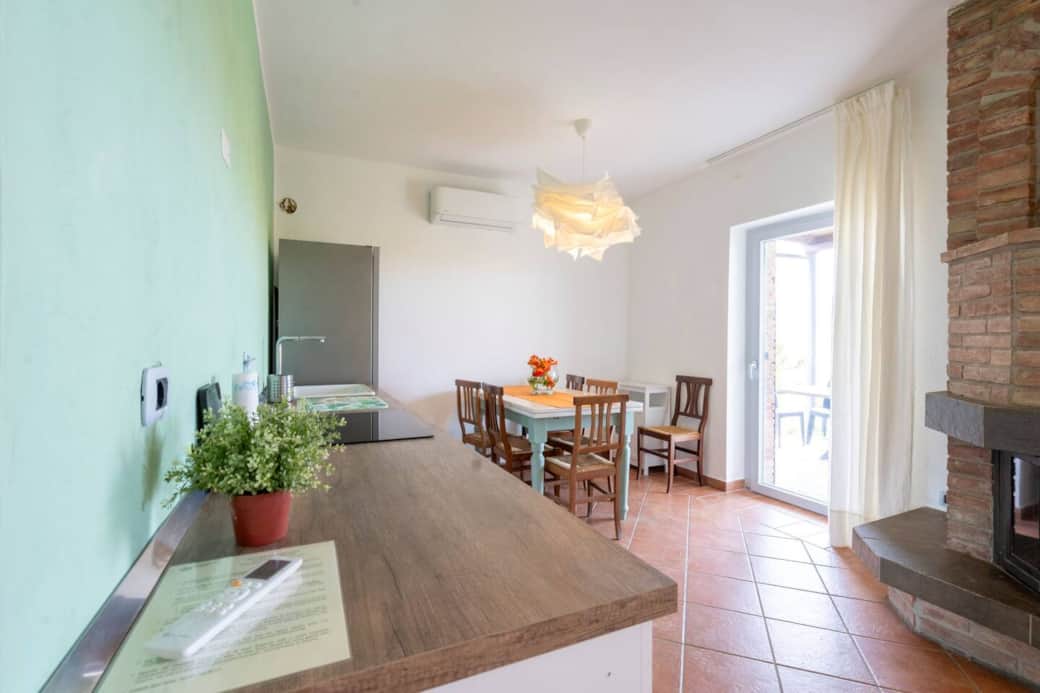 Zona pranzo e cucina di casa Quercia Zona pranzo e cucina di casa Quercia