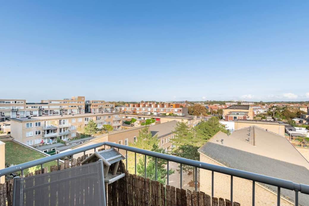 Balcony with high over village view