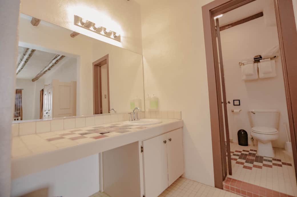 Private en suite bathroom with vanity.