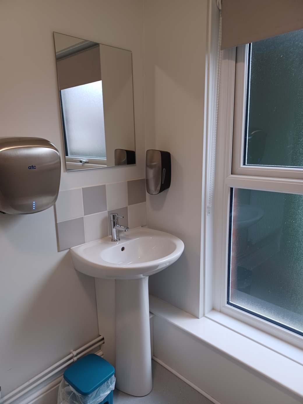 Dormitory bathroom opposite washbasin copy