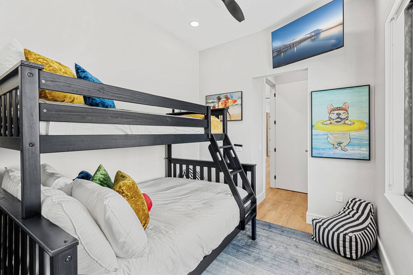 Bunk beds in bedroom 13, with a playful decor make this room perfect for kids or groups.