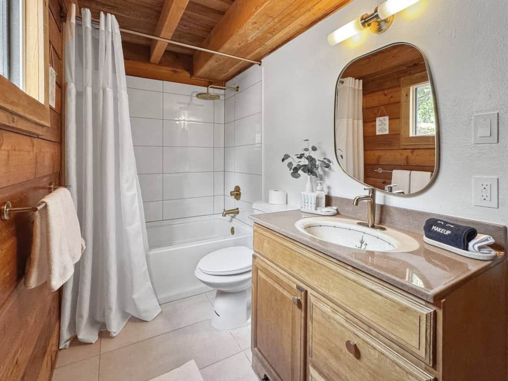 1st floor: Recently remodeled, this bathroom features a deep soaking bathtub for ultimate relaxation. Thoughtfully stocked with high-quality essentials.  1st floor: Recently remodeled, this bathroom features a deep soaking bathtub for ultimate relaxation. Thoughtfully stocked with high-quality essentials.