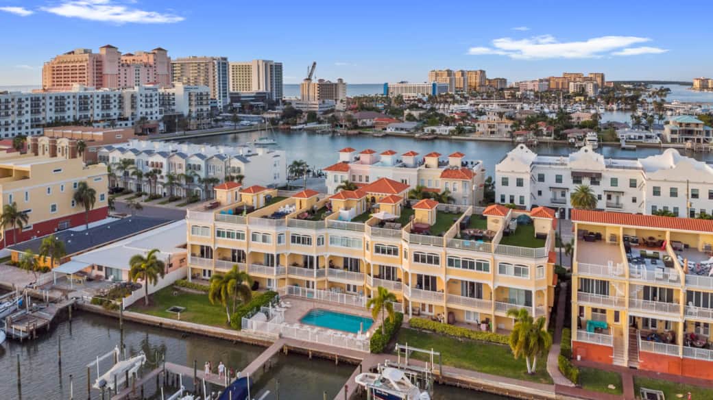 Aerial view of the home shows its location on the intracoastal and close proximity to the beach