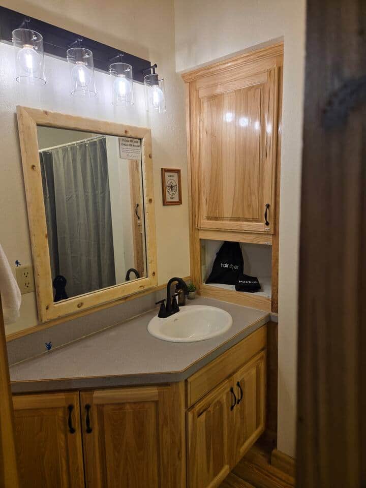 Enjoy convenient privacy in the main floor bathroom that features a tub and shower combo.