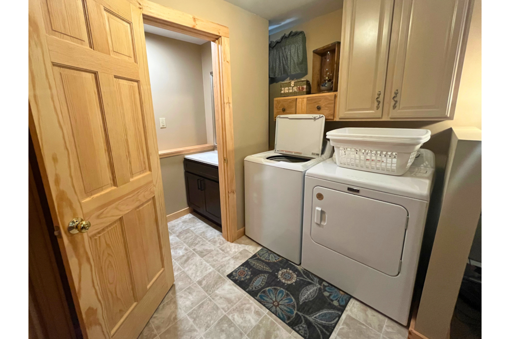 Laundry in the walk out basement. 