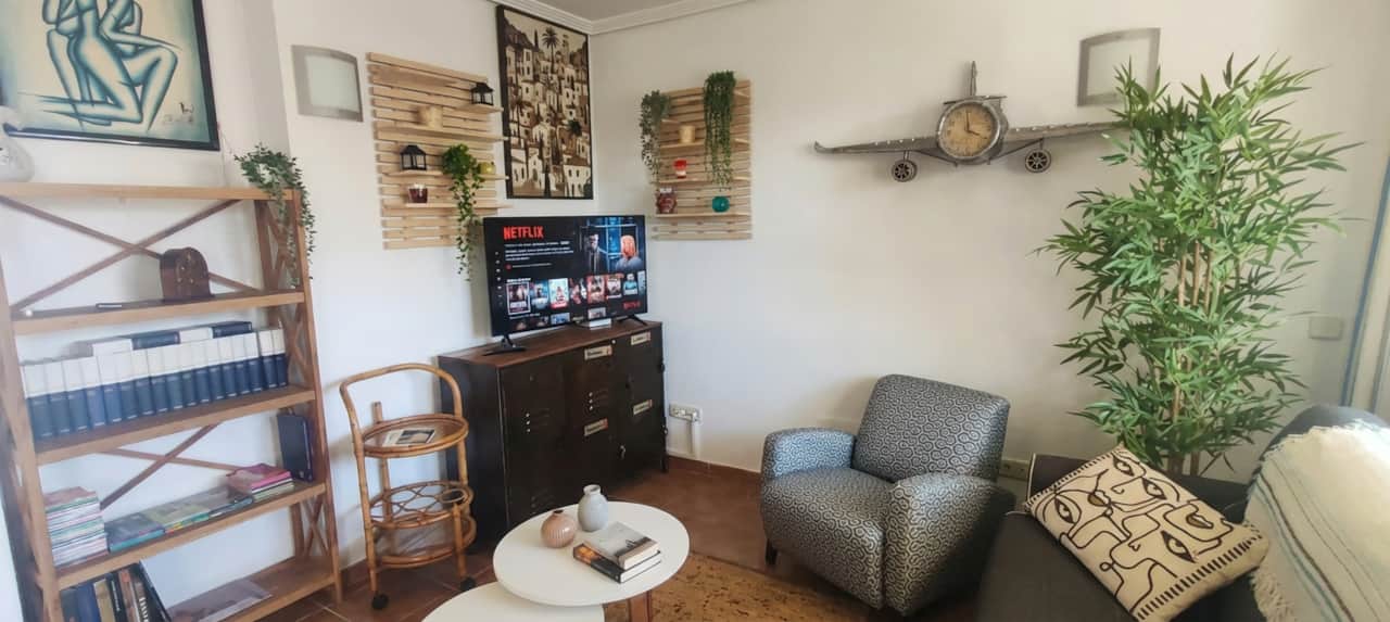 Eclectic Living Room With TV-4