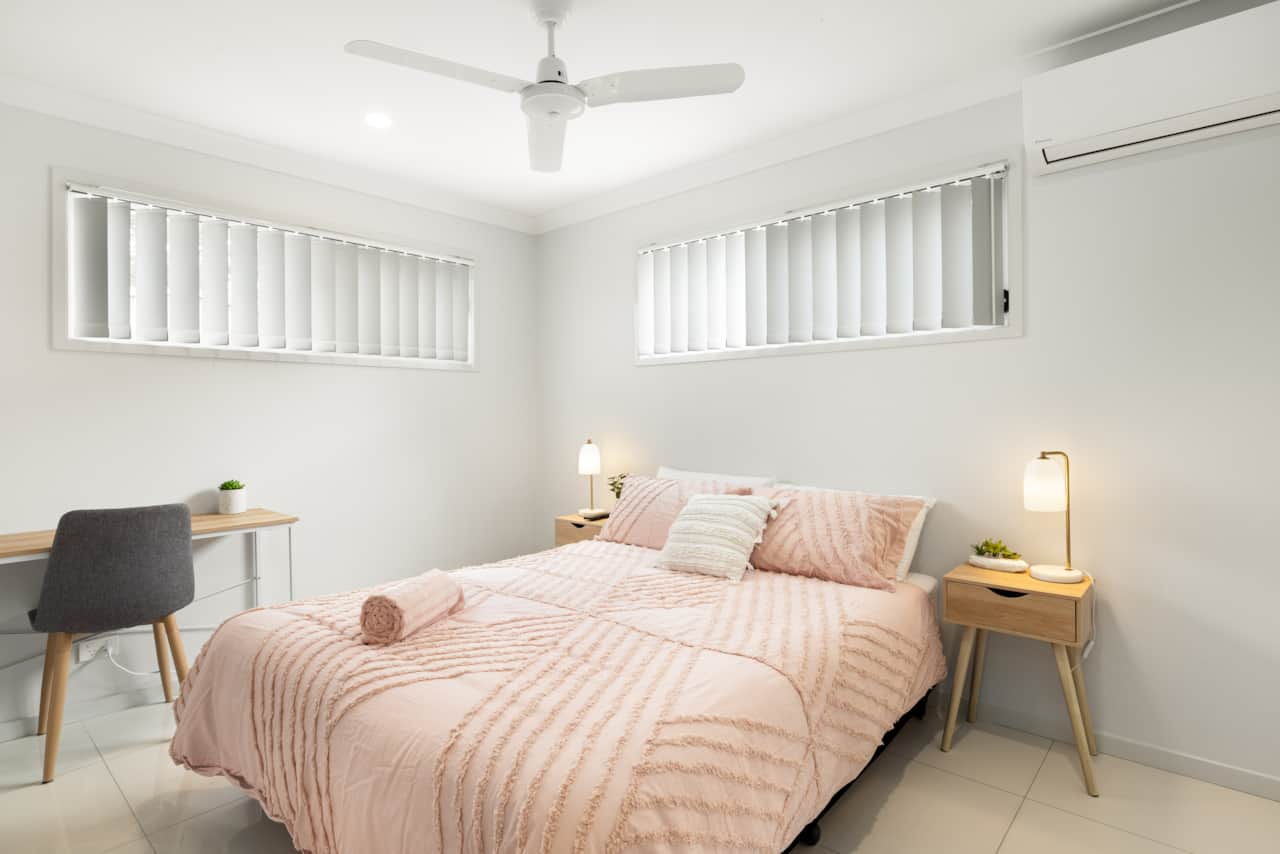 Bedroom: Peaceful bedroom with cozy design and ample storage 