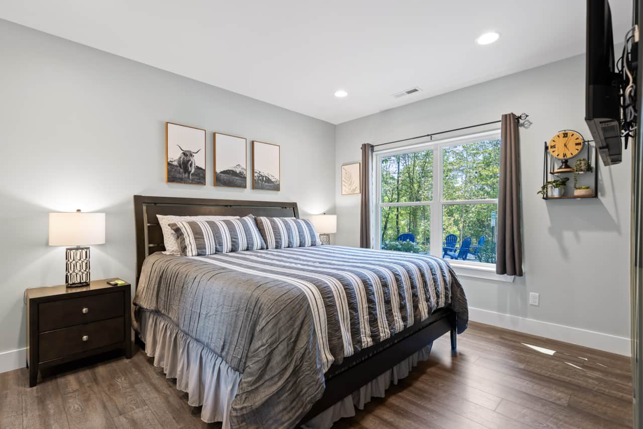 King Bed in Master Bedroom with Large HDTV Flatscreen