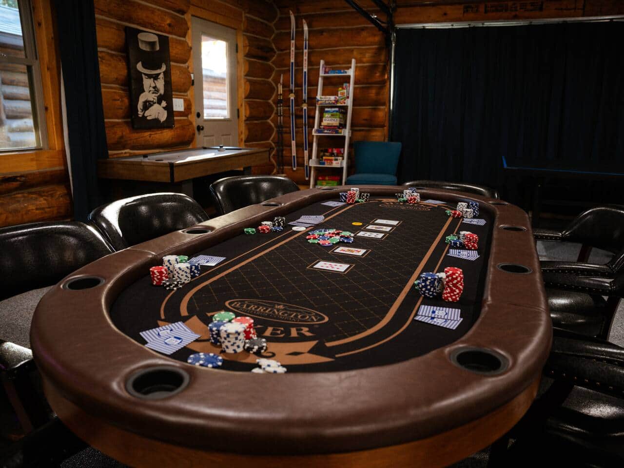 Epic game room! 10 person texas hold'em table, air hockey, ping pong table, board games, arcade games, billiards, shuffleboard, basketball  and HUGE tv