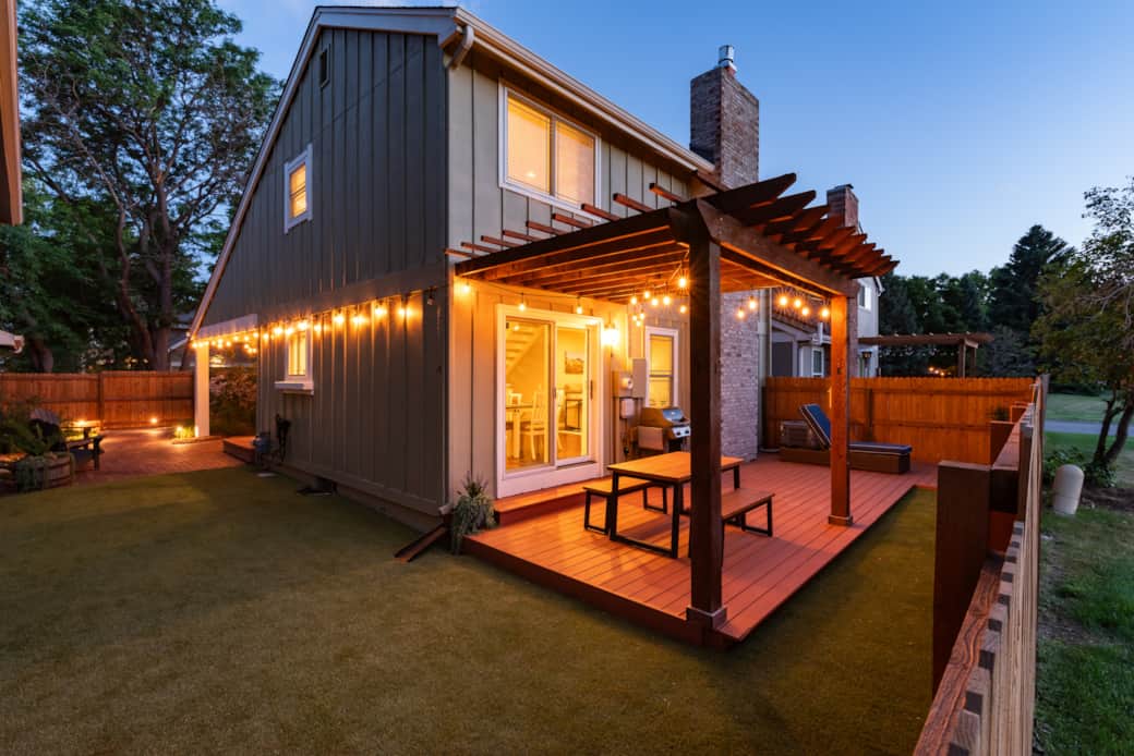 Enjoy a beautiful summer evening outdoors with the well lit dining area on the back deck. Enjoy a beautiful summer evening outdoors with the well lit dining area on the back deck.