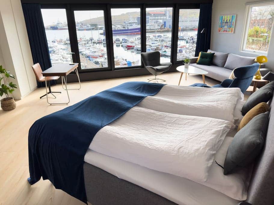 Wake up to stunning views of the marina from the comfort of your luxurious king-sized bed