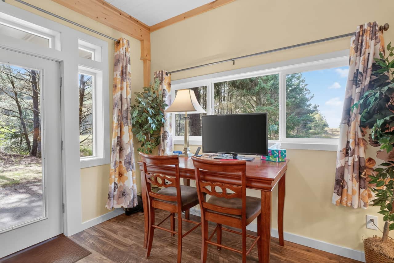 Desk with monitor in lower living room.jpg