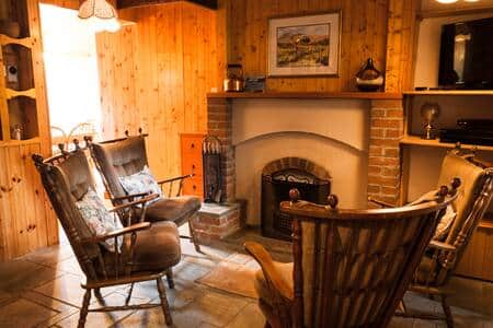 Open fire in sitting room; perfect for cozy fireside chats