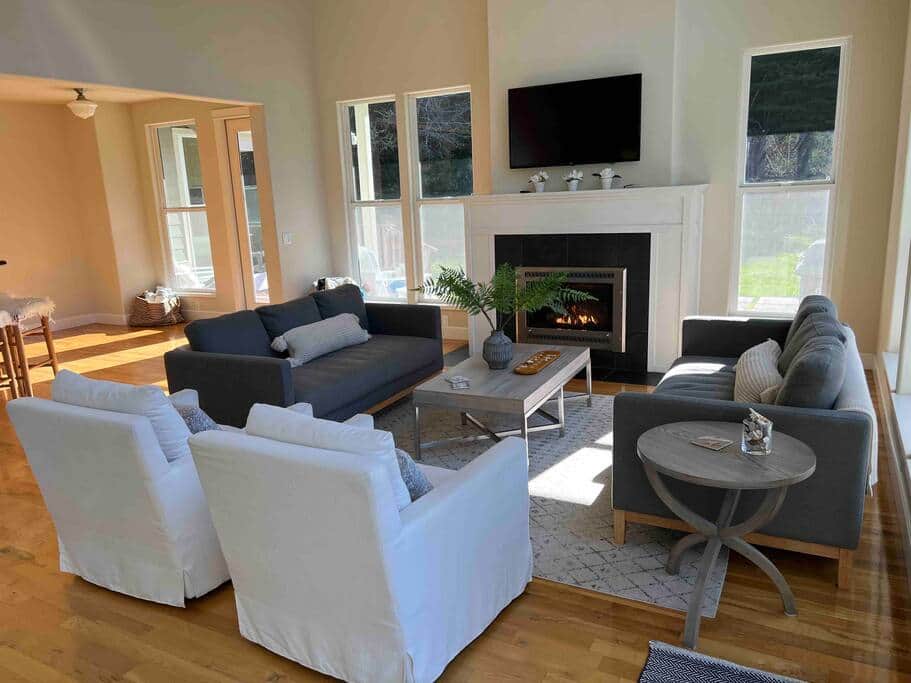 Relax in the living room around the fireplace, play games on the coffee table while watching a movie