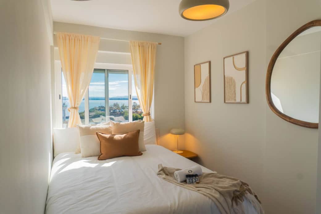 This bright, air-conditioned room features a comfy bed, desk, water view, and a full wardrobe.