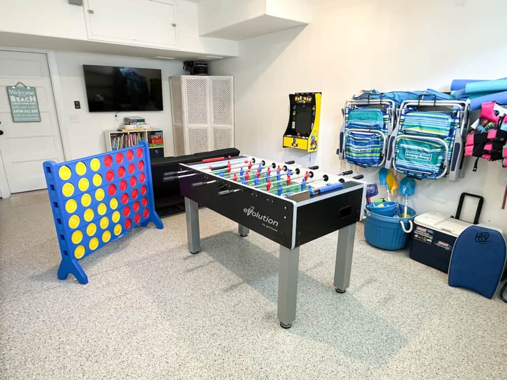 The ultimate rainy-day insurance. Full game room for all ages—foosball, arcade games, board games & Roku TV for rainy days or evenings in.