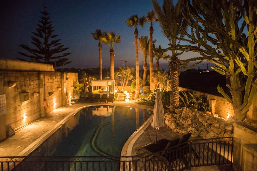 Outdoor Pool and Garden at night