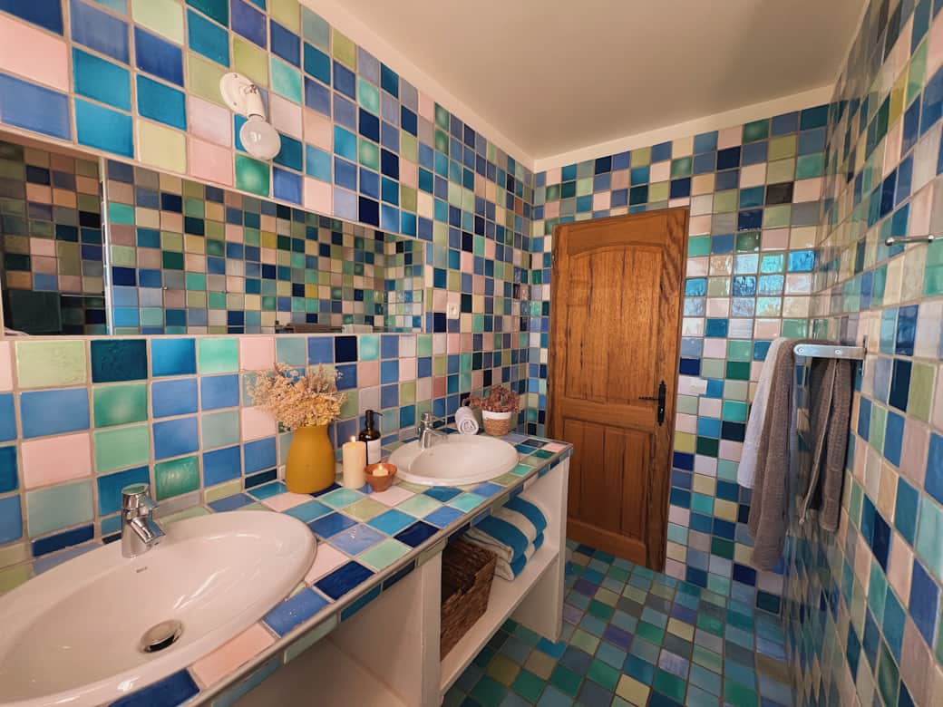 The upper bathroom made of local crafted tiles The upper bathroom made of local crafted tiles