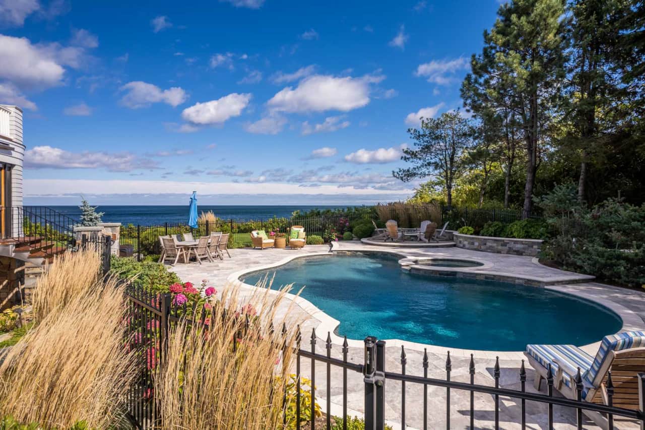Stunning new in-ground pool, hot tub and fire pit outside