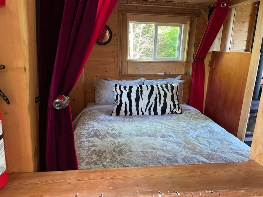 queen bed with curtains