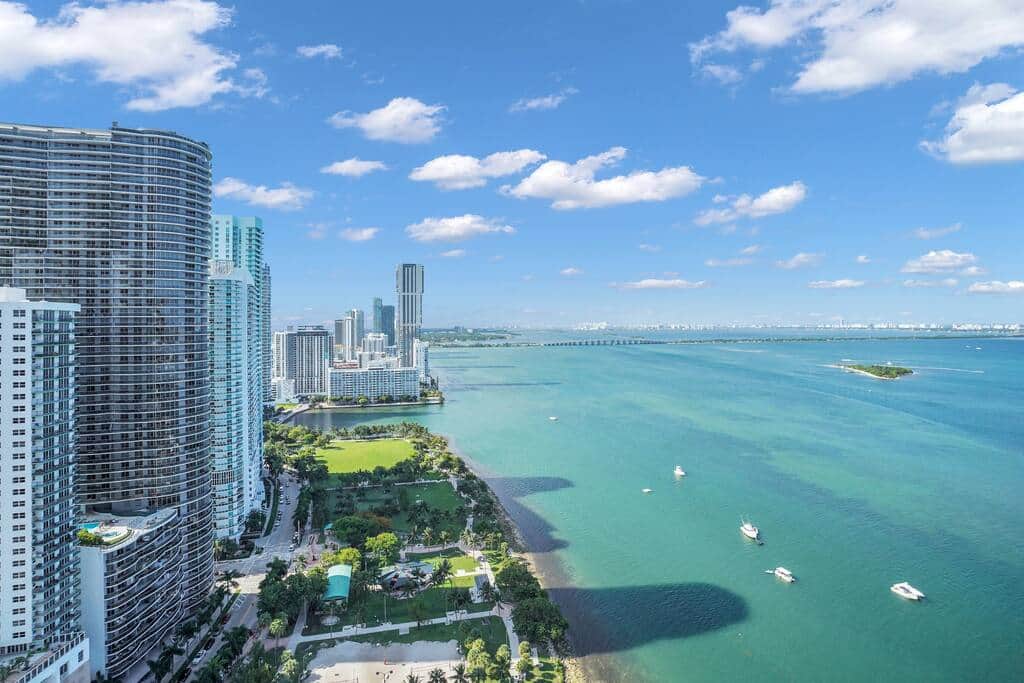Furnished balcony with water views of Biscayne Bay and views of Margaret Pace Park from 39th floor