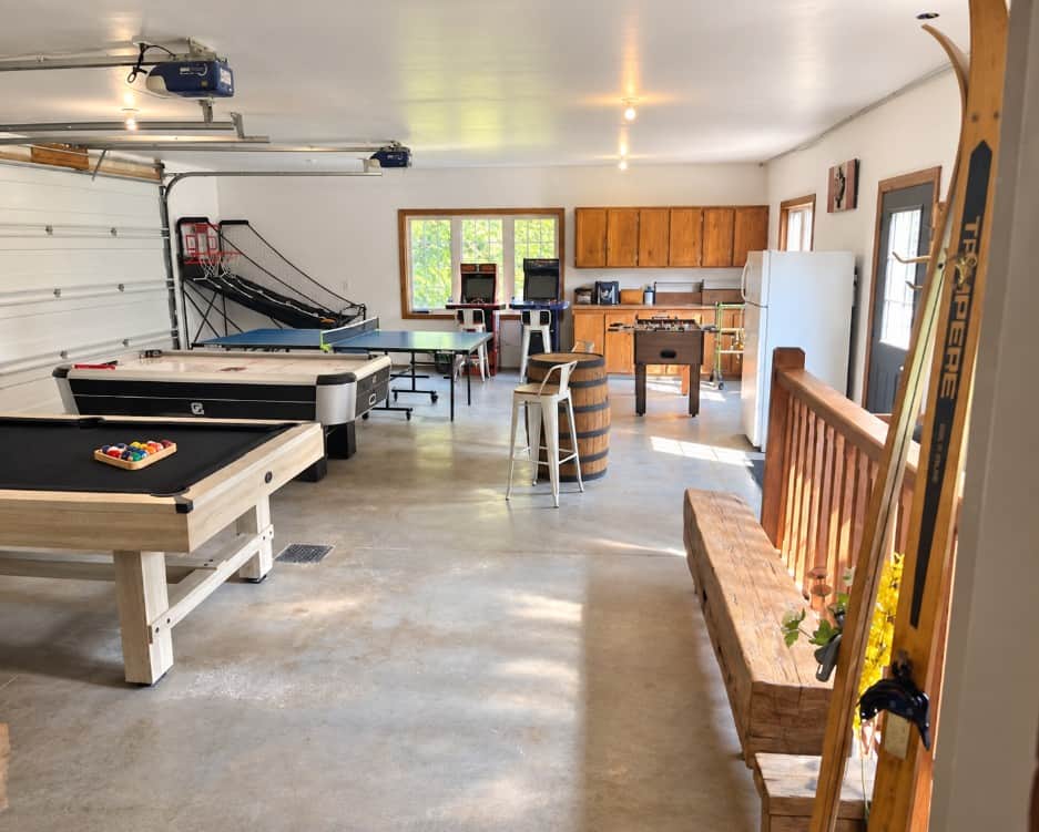 Games room with pool table, air hockey, ping pong, foosball, and basketball shootout as well as NBA 